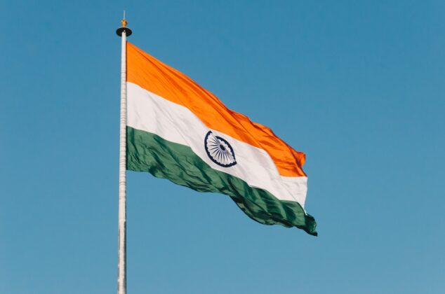 TransPerfect announces the opening of new office in India flag hanging on pole