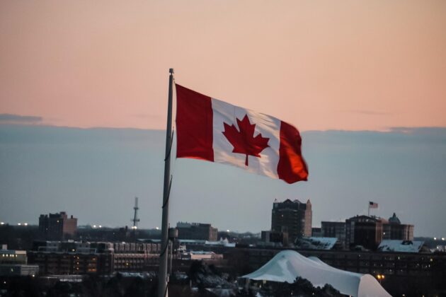 Two literary translations shortlisted for $60,000 prize in Canada waving Canada flag