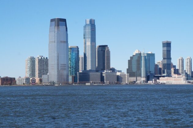 Language access law passes in New Jersey state senate a large body of water with a city in the background