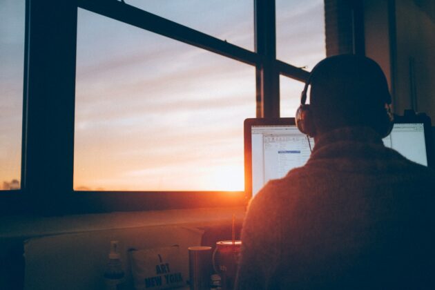 Aligning Values: Fostering productivity and efficiency in the age of the smart company man sitting facing monitor