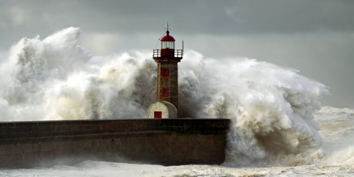 Lighthouse and wave