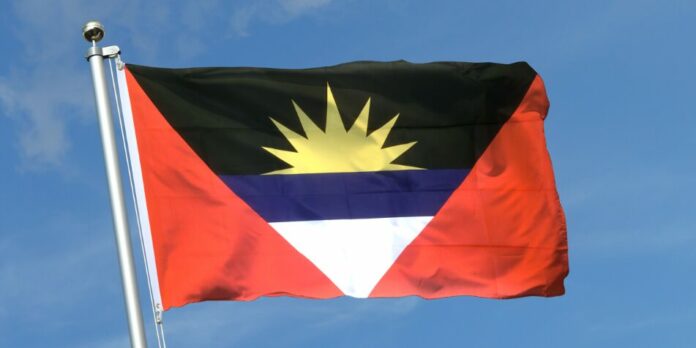 Antigua and Barbuda flag being flown