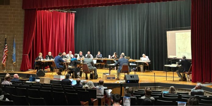 The South Dakota Board of Minerals and Environment Conducts a Hearing on a Uranium Exploration Permit Application The South Dakota Board of Minerals and Environment conducts a hearing about a uranium exploration permit application on May 19, 2026, at the Mueller Civic Center in Hot Springs, South Dakota. (Photo by Meghan O’Brien/South Dakota Searchlight)