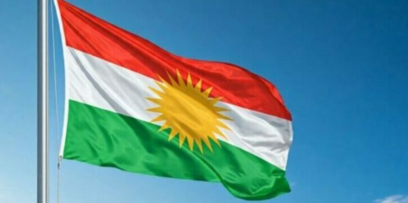 Kurdish Language Conference Establishes Transnational Confederation to Safeguard the Future of Kurdish Kurdish flag waving.