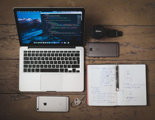 OpenAI Develops English to Code Translation System silver MacBook turned on